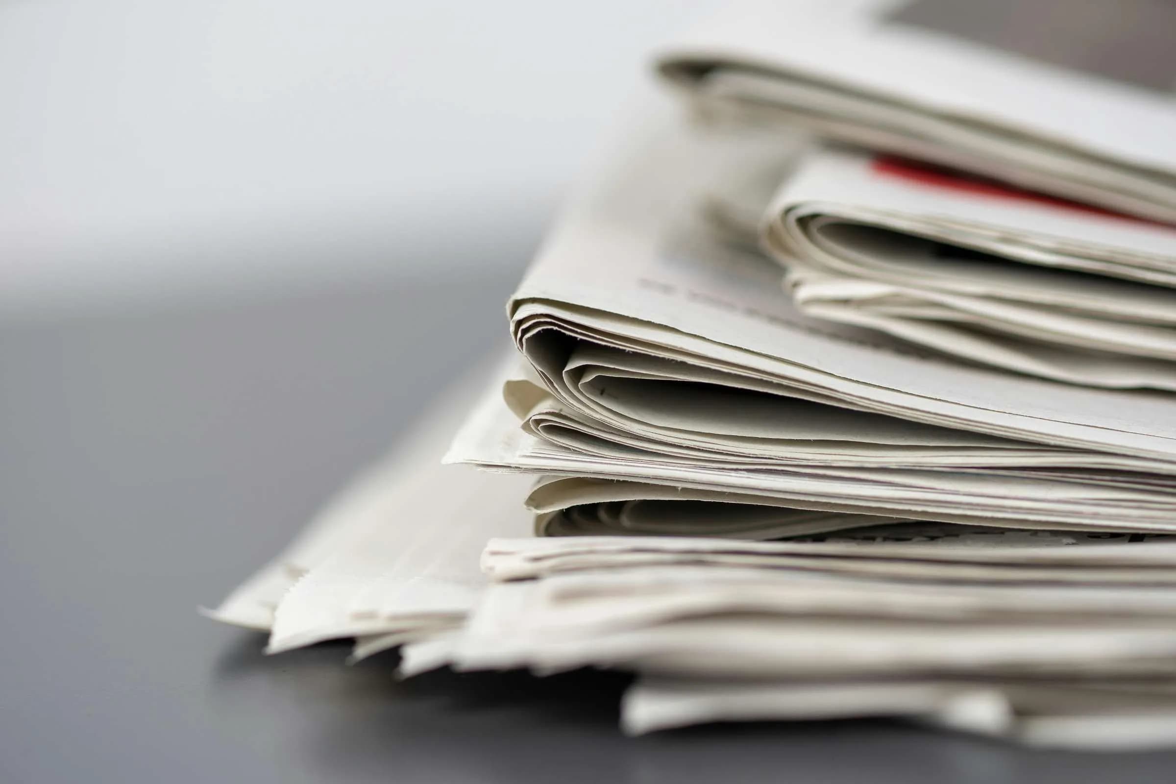 A stack of newspapers.